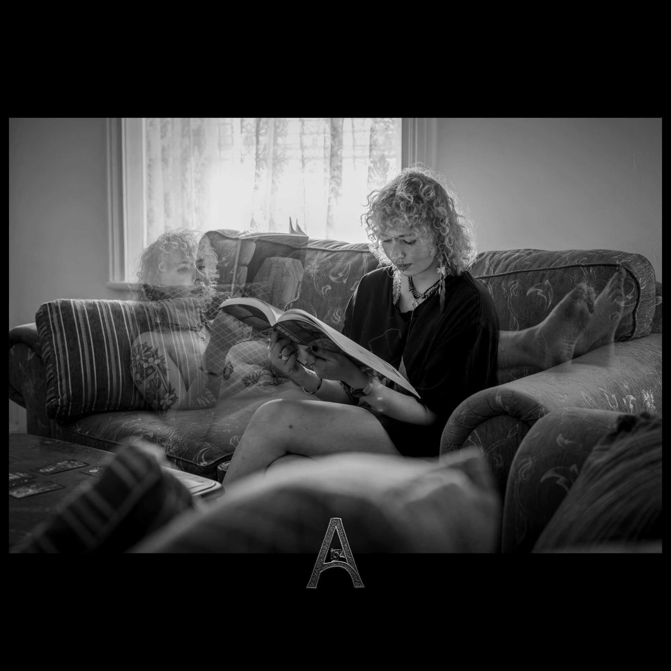 ALTAR logo by Glenn Alderson featuring an ornate letter A with a hidden camera, symbolising photography, identity and self-discovery.