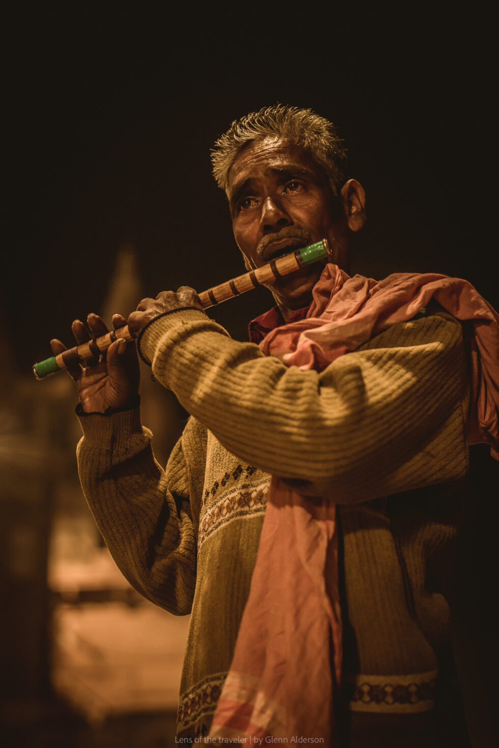 A musician playing a flute, Varanasi, India — Glenn Alderson