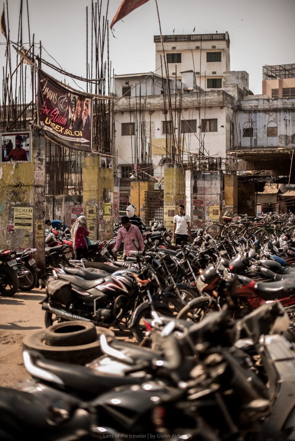 Motorcycles parked along a city street, Varanasi, India — Glenn Alderson