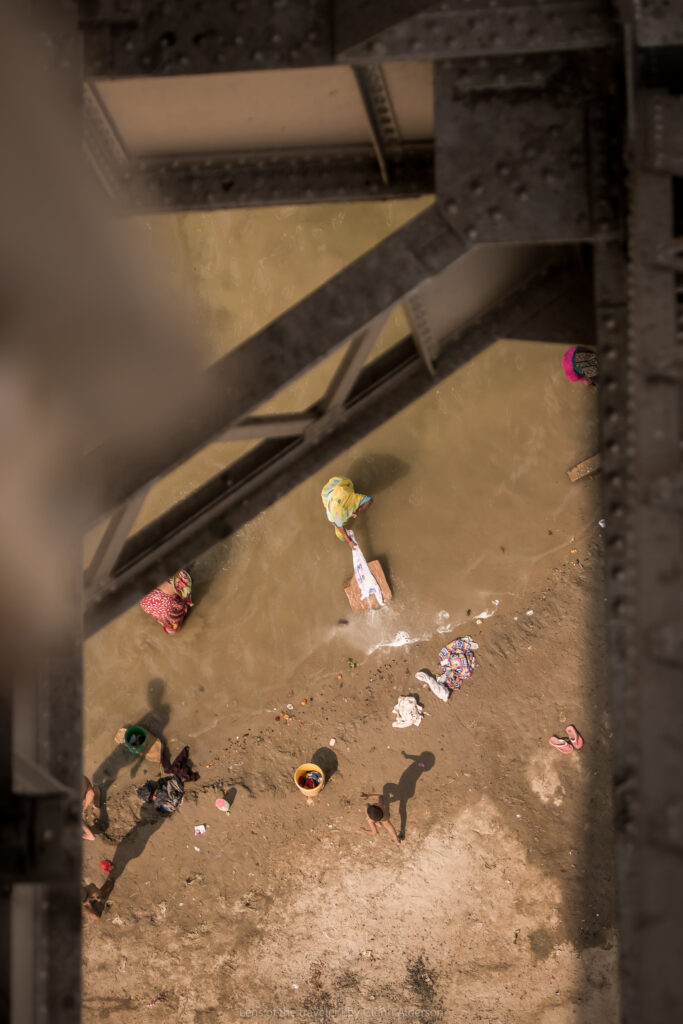 People on the riverbank viewed from above, Varanasi, India — Glenn Alderson
