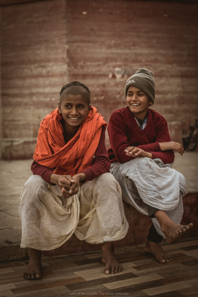 Two people sitting on steps, Varanasi, India — Glenn Alderson