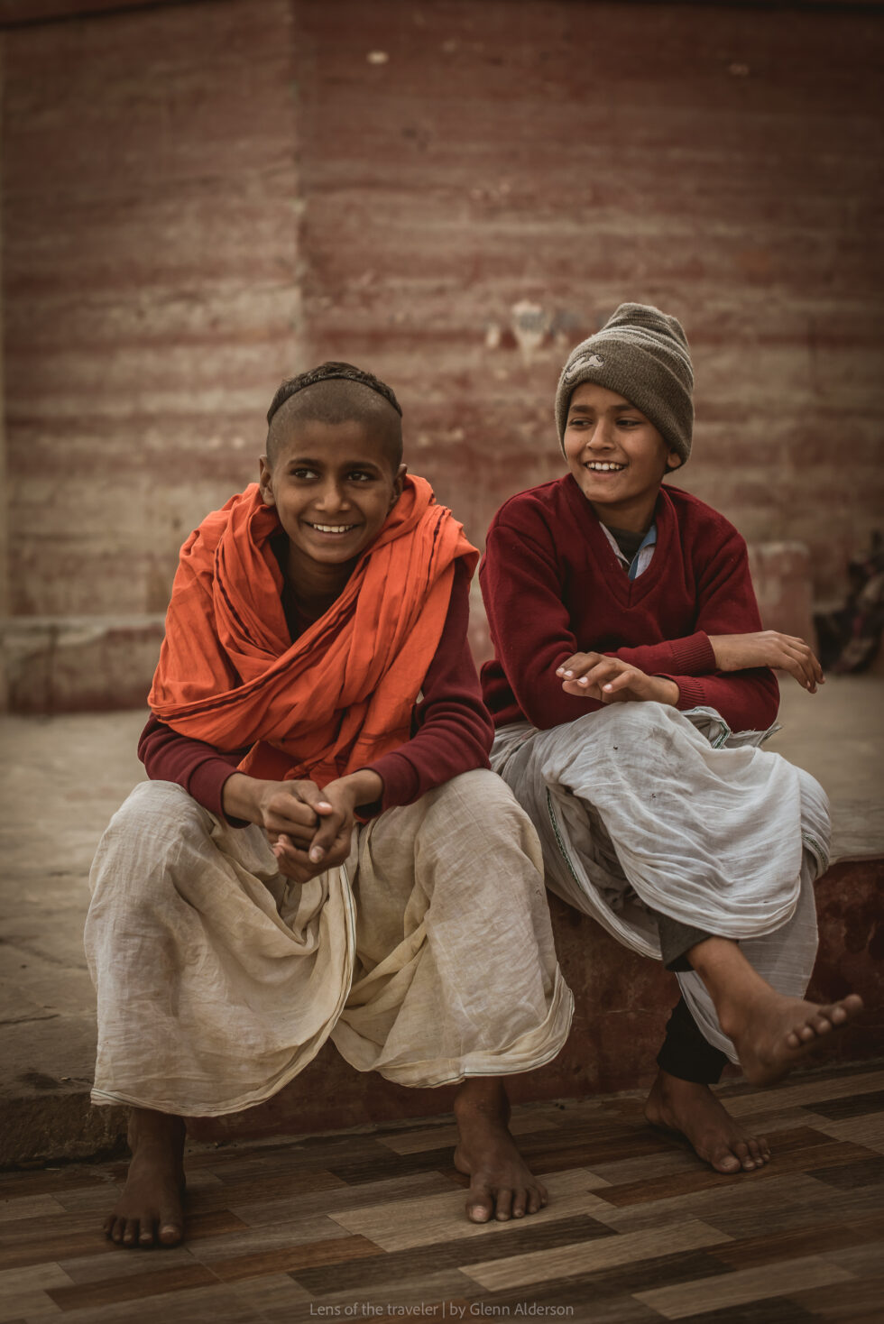 Two people sitting on steps, Varanasi, India — Glenn Alderson