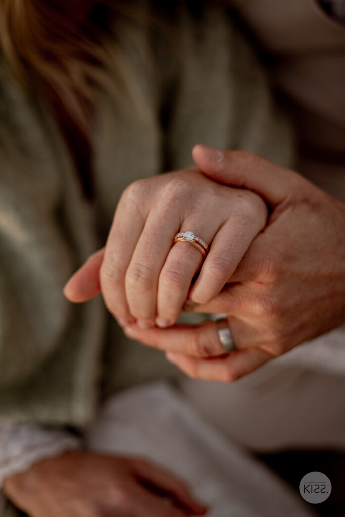A close view of hands resting together